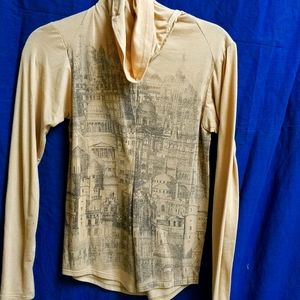 Cityscape tan turtleneck by Jared Gold